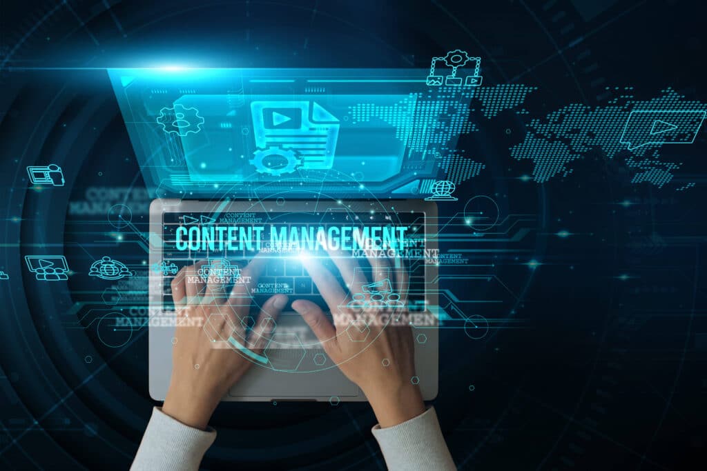 Man using a laptop with content management on the keyboard analyzes and develops various information about content creation, organization, and governance throughout the digital content lifecycle. AdobeStock 1425395339 e1749742829705 uai 6600x4400 1